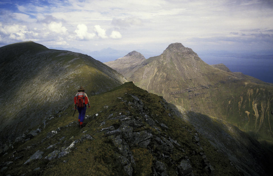 Mountain walking on Isle of Rhum, Scotland. (Photo by: Photofusion/Universal Images Group via Getty Images)