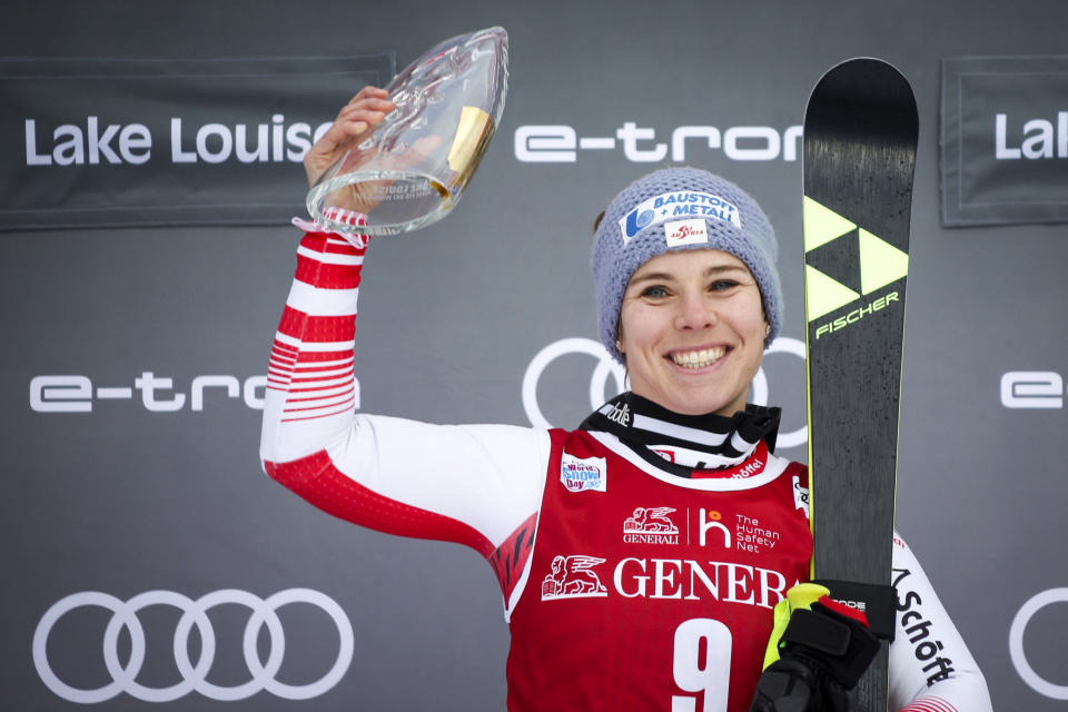 Austria's Nicole Schmidhofer celebrates her win in the women's World Cup downhill ski race, Saturday, Dec. 7, 2019 in Lake Louise, Alberta. (Jeff McIntosh/The Canadian Press via AP)