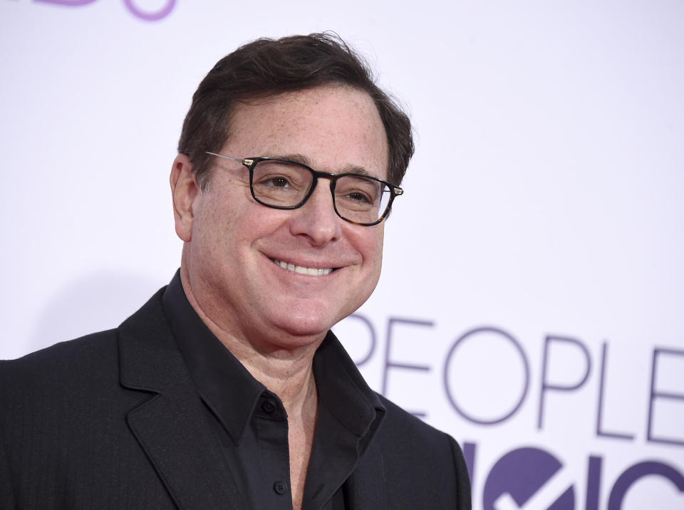 Bob Saget arrives at the People's Choice Awards at the Microsoft Theater on Wednesday, January 18, 2017, in Los Angeles. / Credit: Jordan Strauss