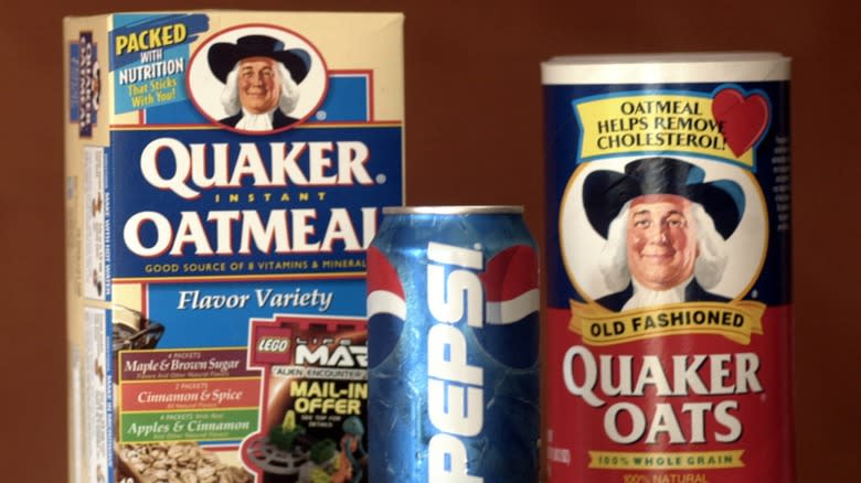 Packages of Quaker oats and oatmeal next to a can of Pepsi