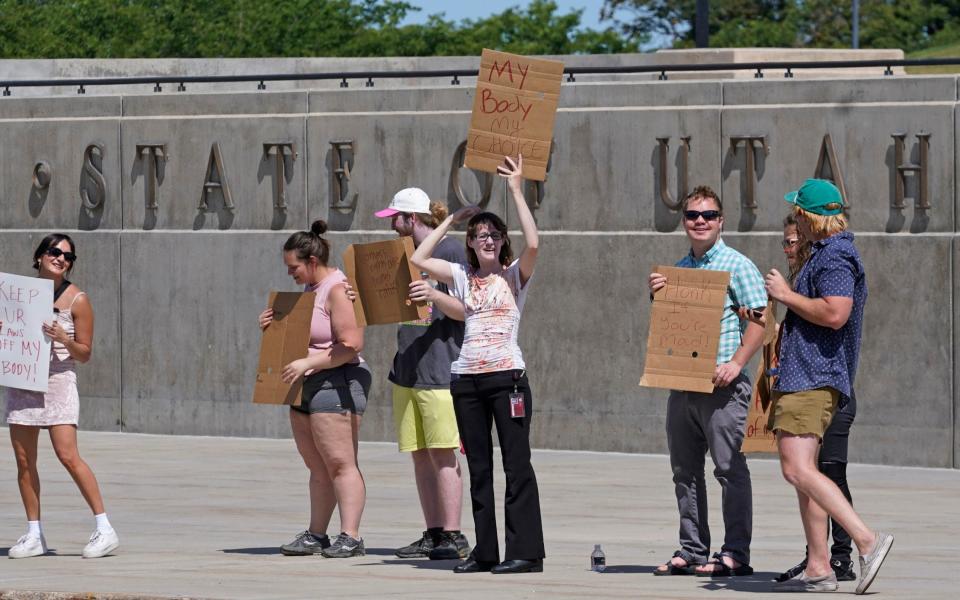 People protest for abortion-rights at the Utah State Capitol - AP Photo/Rick Bowmer