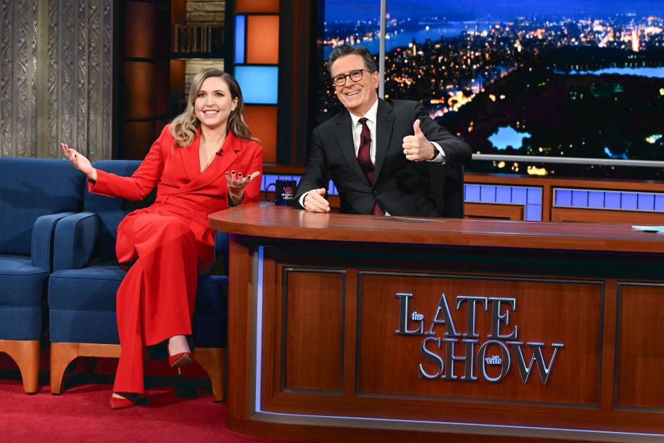 Tomlinson wears a suit on The Late Show with Stephen Colbert.