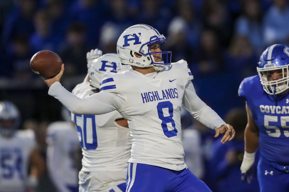 Highlands quarterback Brody Benke (8) throws a pass against Covington Catholic in the first half at Covington Catholic High School Oct. 14, 2022.