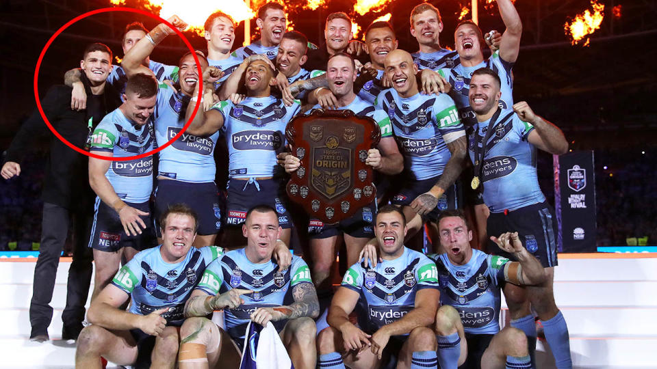 Mitchell Pearce made sure Nathan Cleary was part of the celebrations. (Photo by Cameron Spencer/Getty Images)