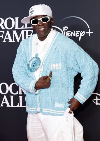 <p>Mike Coppola/WireImage</p> Flavor Flav at the 2023 Rock and Roll Hall of Fame induction ceremony in New York City in November 2023