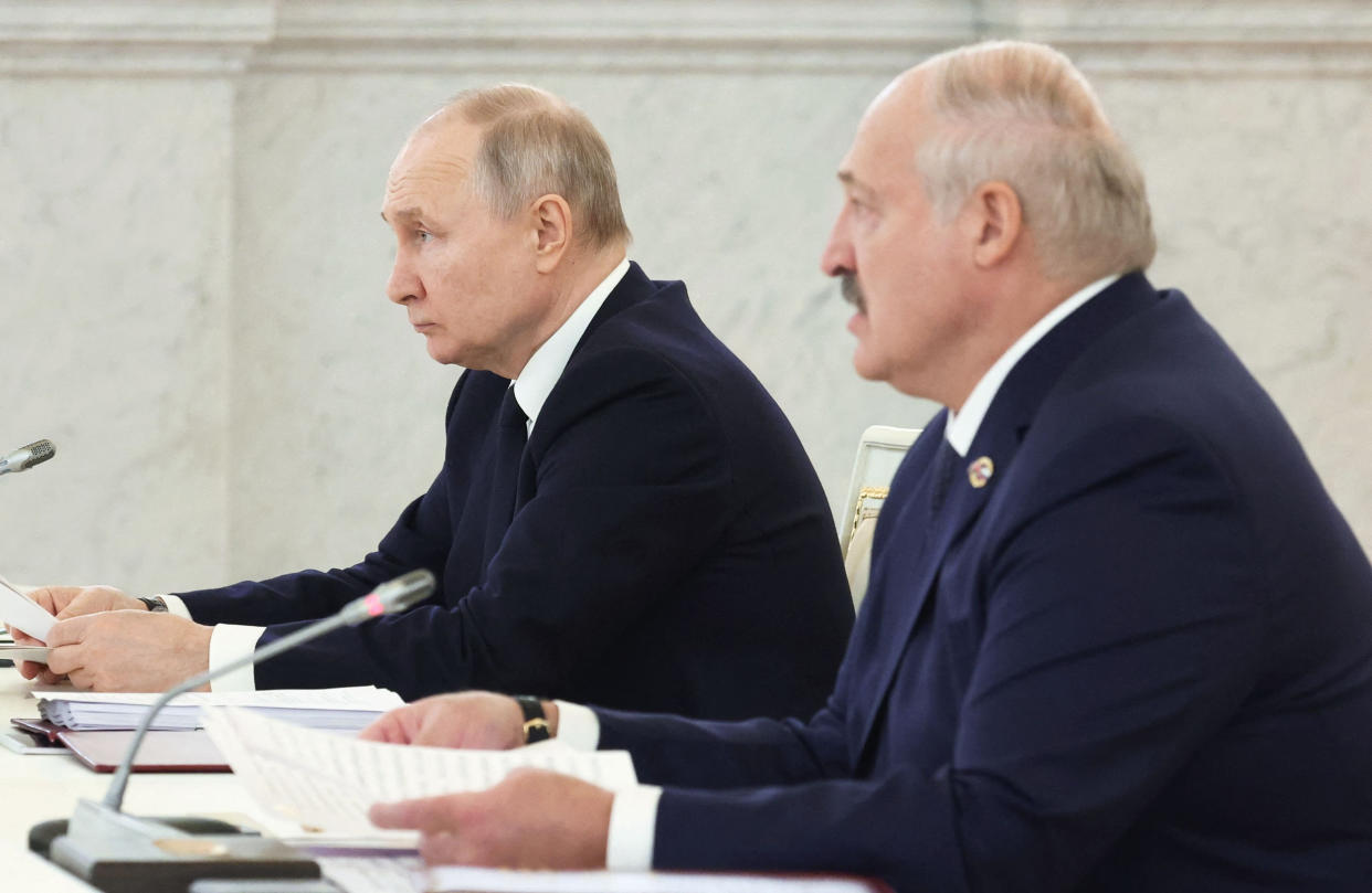 Russian President Vladimir Putin and Belarus's President Alexander Lukashenko at the Kremlin (Mikhail Klimentyev / AFP via Getty Images file)