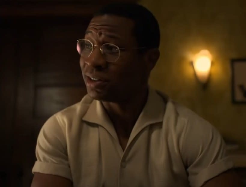 Jonathan Majors as Atticus talking to someone