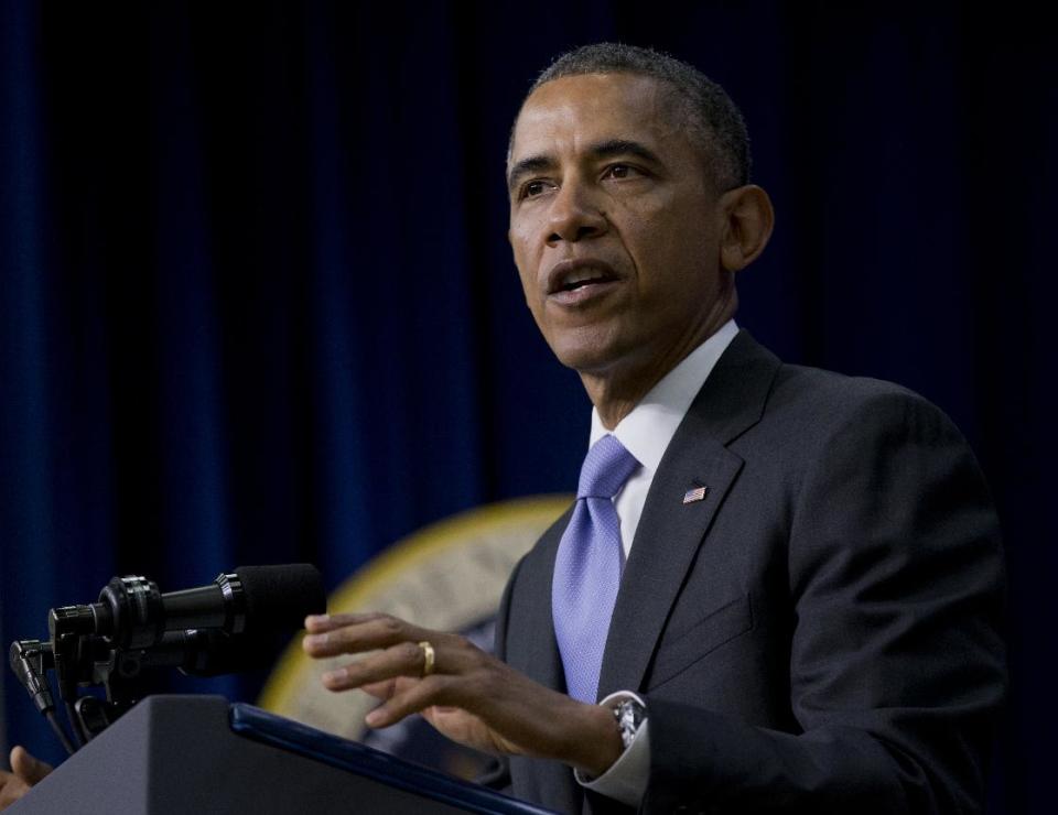 President Barack Obama gestures as he speaks during an Expanding College Opportunity event, Thursday, Jan. 16, 2014, in the South Court Auditorium in the Eisenhower Executive Office Building on the White House complex in Washington. (AP Photo/Carolyn Kaster)