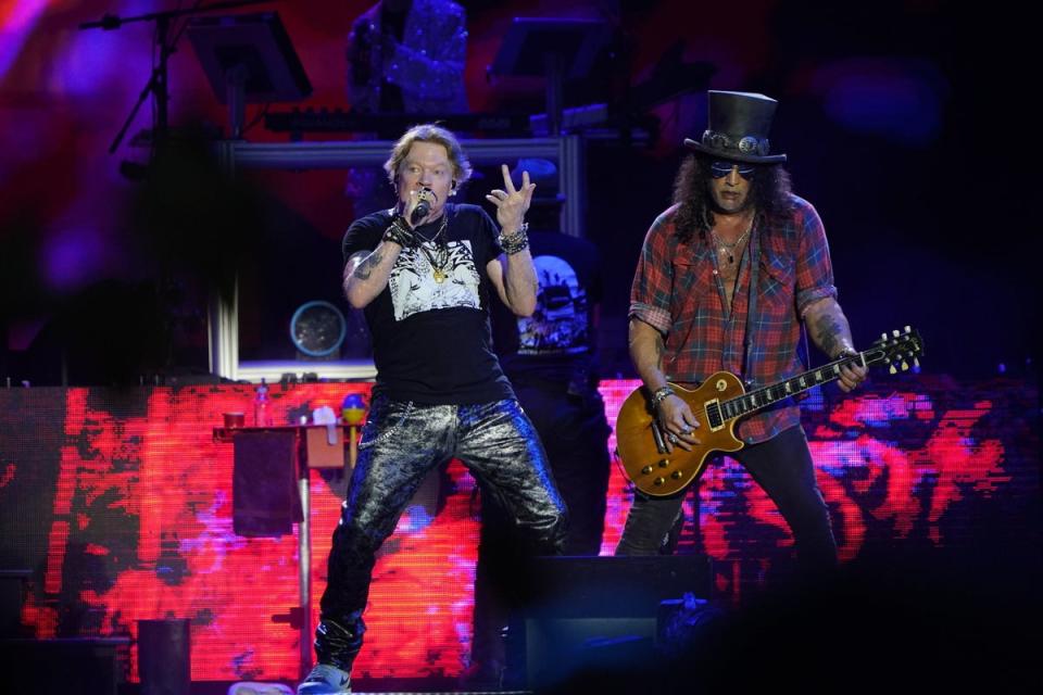 Axl Rose and Slash perform on the Pyramid Stage (PA)