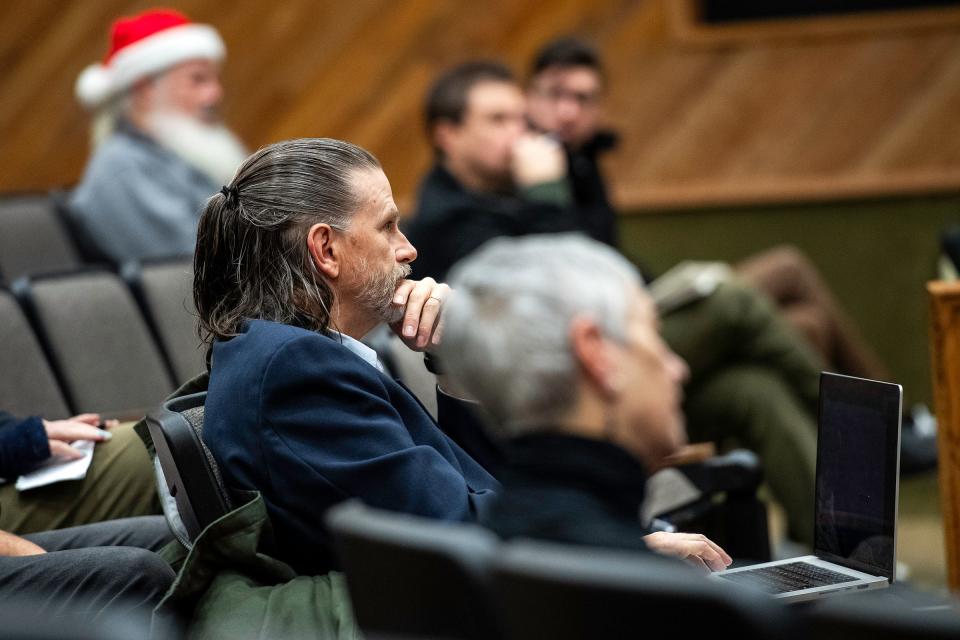 Ross Cunniff, a founder of Preserve Fort Collins and chairman of its board, listens to a protest hearing about the group's petition effort to stop land use code changes at City Hall in Fort Collins on Dec. 13, 2023.