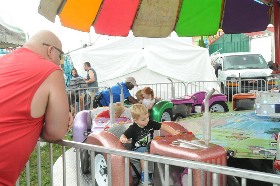 Children enjoy rides at the Boonville-Oneida County Fair before the COVID-19 pandemic.