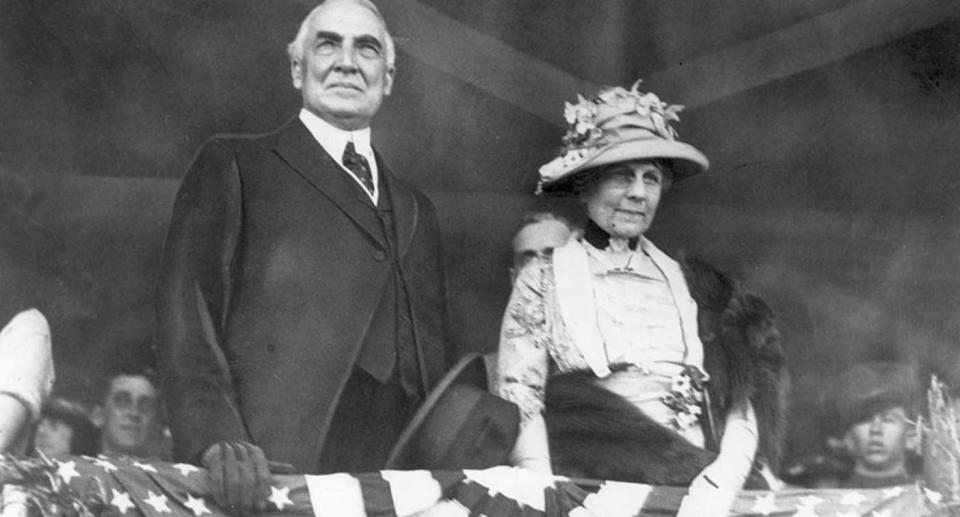 American president Warren G Harding (1865 - 1923) and his wife, First Lady Florence Harding, watch a horse show from a balcony, Washington DC. (Photo by Hulton Archive/Getty Images)