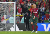 Portugal's Cristiano Ronaldo leaves the field after his team's 6-1 victory over Switzerland at the end of the World Cup round of 16 soccer match between Portugal and Switzerland, at the Lusail Stadium in Lusail, Qatar, Tuesday, Dec. 6, 2022. (AP Photo/Manu Fernandez)