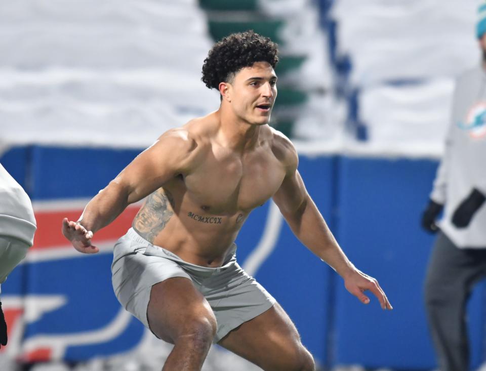 Dec 17, 2022; Orchard Park, New York, USA; Miami Dolphins linebacker Jaelan Phillips warms up before a game against the Buffalo Bills at Highmark Stadium. Mandatory Credit: Mark Konezny-USA TODAY Sports