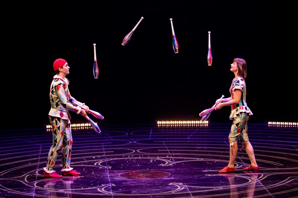 Juggling by performers in Cirque du Soleil's "Corteo."