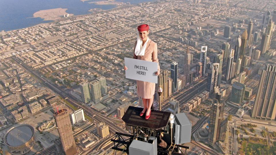 Professional stuntwoman Nicole Smith-Ludvick stands at the top of the Burj Khalifa in Dubai.