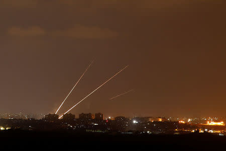 Streaks of light are pictured as rockets are launched from the northern Gaza Strip towards Israel, as seen from Sderot, Israel August 8, 2018. REUTERS/Amir Cohen