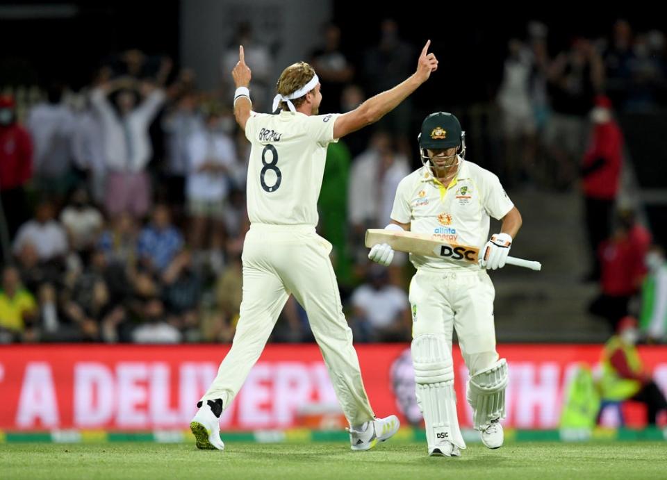 England’s Stuart Broad celebrates the wicket of Australia opener David Warner. (PA Media)