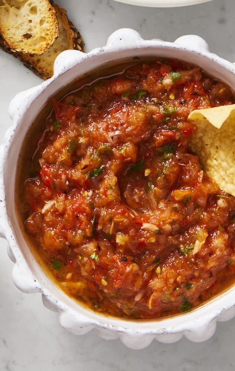 <p>Grilling nearly all of the ingredients before blending gives this salsa its uniquely smoky flavor.</p><p><em><a href="https://www.goodhousekeeping.com/food-recipes/party-ideas/a28507963/charred-salsa-recipe/" rel="nofollow noopener" target="_blank" data-ylk="slk:Get the recipe for Charred Salsa »;elm:context_link;itc:0;sec:content-canvas" class="link ">Get the recipe for Charred Salsa »</a></em></p>