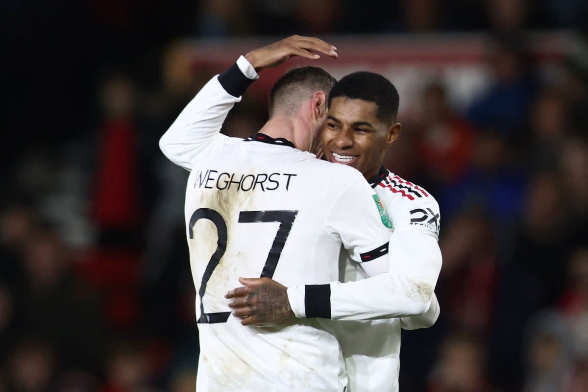 Marcus Rashford celebrates his goal with teammate Wout Weghorst (AFP via Getty Images)