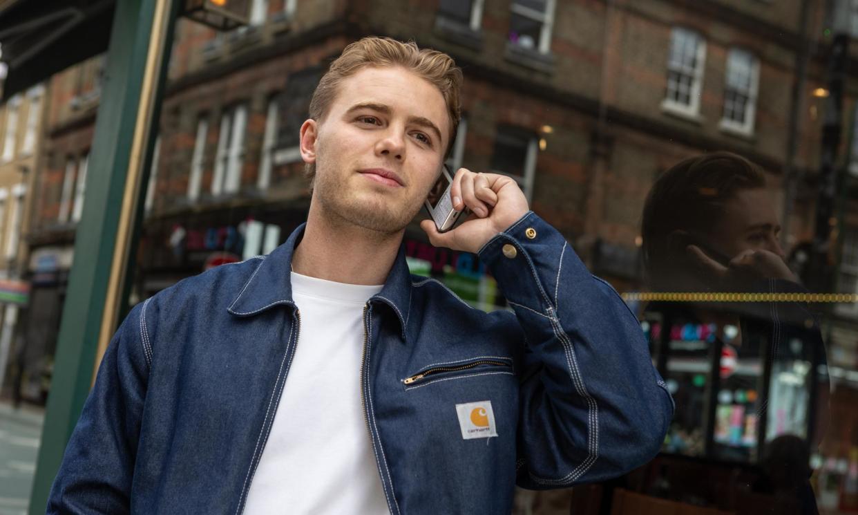 <span>Tech sales executive Piers Garrett, 27, says he has a coffee and reads a book in the morning, rather than scrolling through his phone.</span><span>Photograph: Andy Hall/The Observer</span>