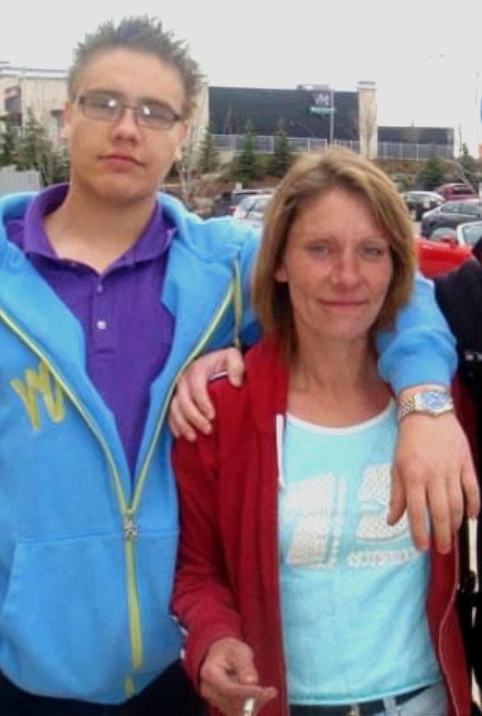 Levi Romeo Mitchell, left, with his mother, Deborah Ann Mitchell, right. He fatally shot her on Oct. 30, 2021. (Deborah Mitchell/Facebook - image credit)