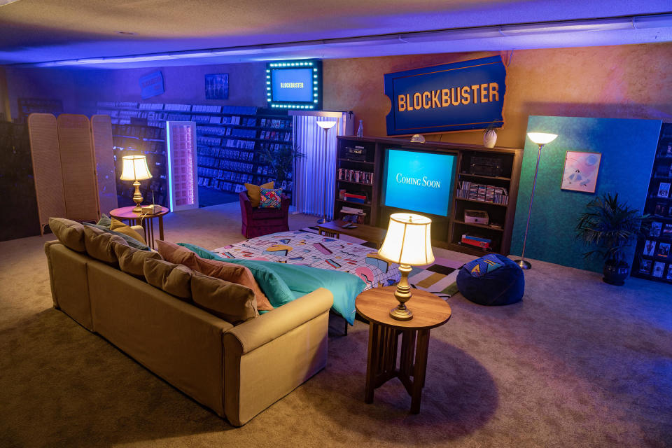 The last Blockbuster on Earth is transformed into a 90s living room. / Credit: Airbnb