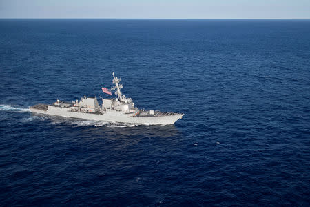 The U.S. Navy Arleigh Burke-class guided-missile destroyer USS Stockdale transits the Philippine Sea November 16, 2018. Picture taken November 16, 2018. U.S. Navy/Mass Communication Specialist 3rd Class Connor D. Loessin/Handout via REUTERS