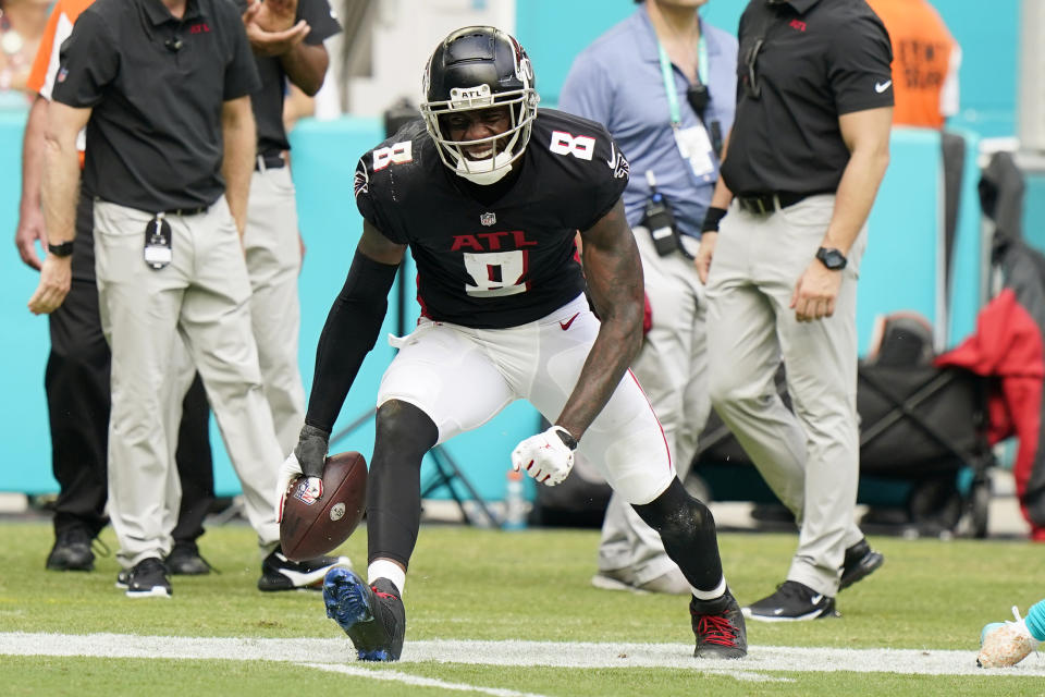 Atlanta Falcons tight end Kyle Pitts (8) celebrates after making a catch during the second half of an NFL football game against the Miami Dolphins, Sunday, Oct. 24, 2021, in Miami Gardens, Fla. (AP Photo/Wilfredo Lee)