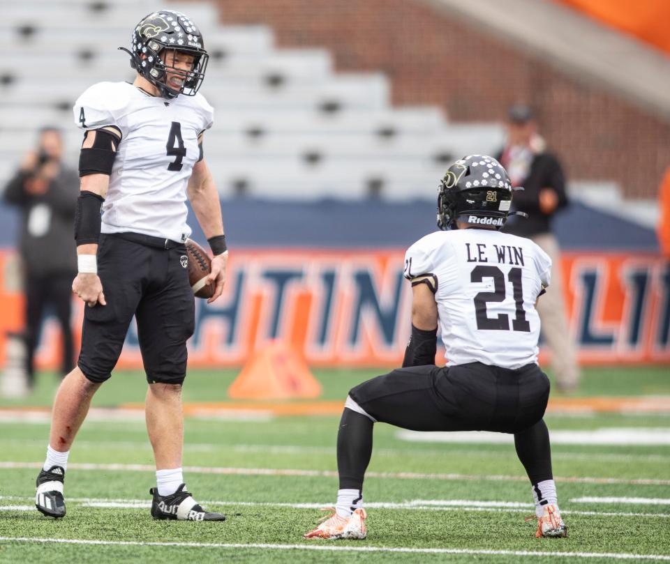 Lena-Winslow's Gage Dunker, No. 4, celebrates his interception with Jake Zeal, No. 21, against Camp Point Central on Friday, Nov. 25, 2022, at University of Illinois in Champaign.