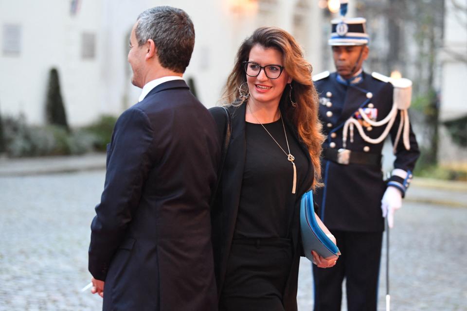 French Interior Minister Gerald Darmanin (L) welcomes French Secretary of State  for Social Economy and Associations Marlene Schiappa prior to the traditional breakfast at the Ministry of the Interior, Place Beauvau in Paris, on January 4, 2023.