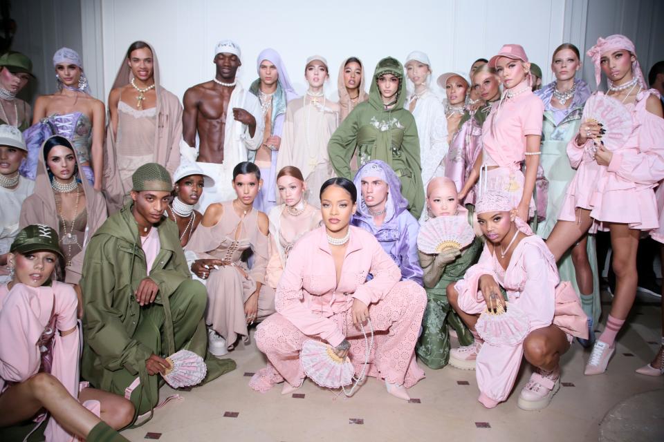 PARIS, FRANCE - SEPTEMBER 28:  Rihanna is seen with models backstage during FENTY x PUMA by Rihanna at Hotel Salomon de Rothschild on September 28, 2016 in Paris, France.  (Photo by Victor Boyko/Getty Images for Fenty x Puma)