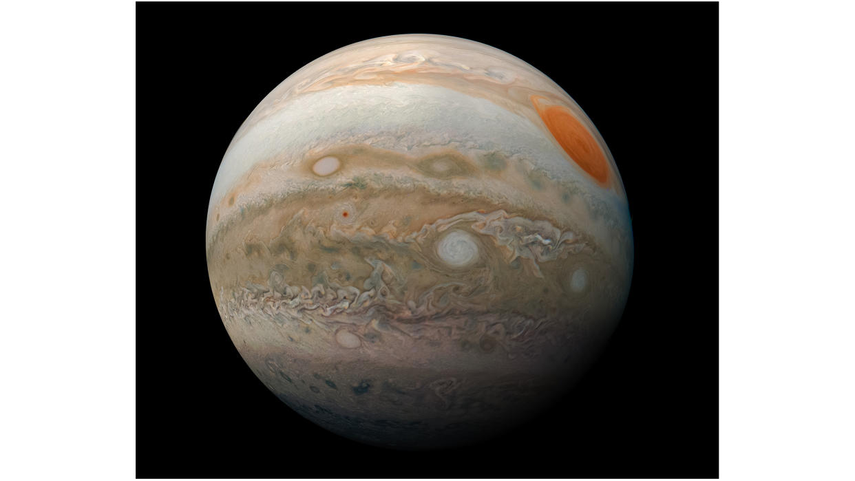  Closeup image of jupiter against the blackness of space. 