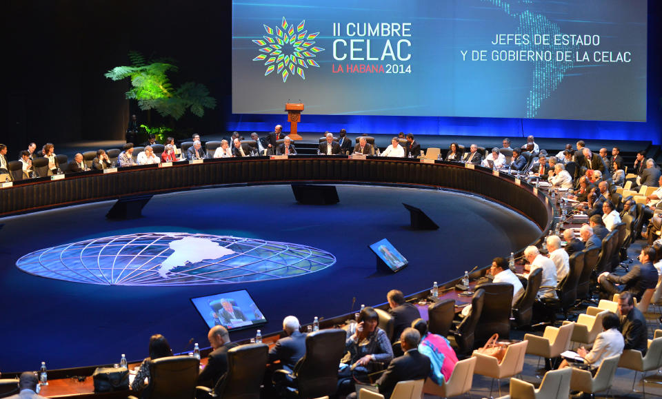 Leaders meet for the second day of the CELAC Summit in Havana, Cuba, Wednesday, Jan. 29, 2014. Leaders from across Latin America and the Caribbean signed a resolution declaring the region a "zone of peace" on Wednesday, pledging to resolve their disputes as respectful neighbors without the use of arms. (AP Photo/Adalberto Roque, Pool)