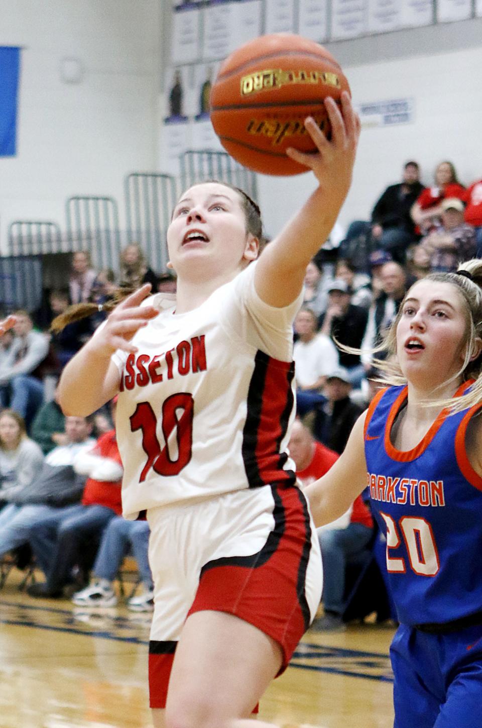 Sisseton’s Hannah Leverson (10) scores in the paint against Parkston’s Keeara Oakley during the fourth quarter of the Redmen’s 59-46 victory over the Trojans in a SoDak 16 Class A girls basketball on Thursday, March 2, 2023 at Sioux Valley High School in Volga.