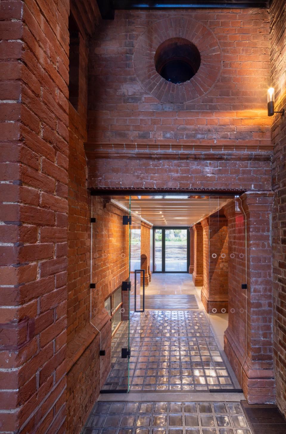 The new spaces open up the area beneath Leighton’s studio looking out onto the gardens (Dirk Lindner Photography)