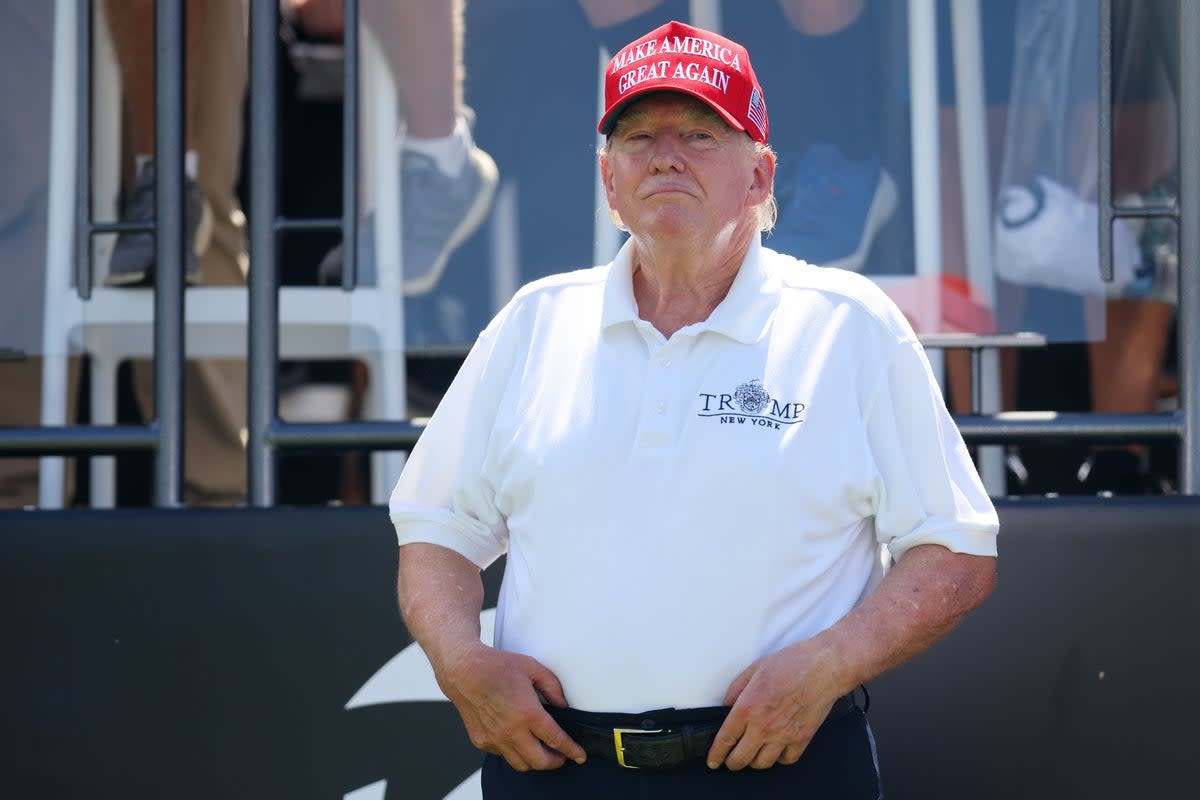 Former President Donald Trump looks on at the first tee prior to the start of day three of the LIV Golf Invitational - Bedminster at Trump National Golf Club on August 13, 2023 (Getty Images)
