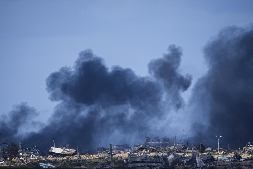 Smoke rises following an Israeli bombardment in the Gaza Strip, as seen from southern Israel, Tuesday, Jan. 30, 2024. U.S. and Mideast mediators appeared optimistic in recent days that they are closing in on a deal for a two-month cease-fire in Gaza and the release of over 100 hostages held by Hamas. But on Tuesday, Israeli Prime Minister Benjamin Netanyahu rejected the militant group's two main demands — that Israel withdraw its forces from Gaza and release thousands of Palestinian prisoners — indicating that the gap between the two sides remains wide. (AP Photo/Ariel Schalit)