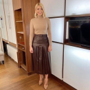 <p>Holly worked a muted yet effortlessly stylish palette today with a Zara skirt that looks more expensive than it is. </p><p><strong>Zara</strong></p><p>Pleated Faux Leather Skirt - £49.99</p><p><a class="link " href="https://www.zara.com/uk/en/pleated-faux-leather-skirt-p02969068.html?v1=43884140&v2=1445719" rel="nofollow noopener" target="_blank" data-ylk="slk:BUY NOW;elm:context_link;itc:0;sec:content-canvas">BUY NOW</a></p><p><strong>H&M</strong></p><p>Fine-knit polo-neck jumper - £12.99</p><p><a class="link " href="https://go.redirectingat.com?id=127X1599956&url=https%3A%2F%2Fwww2.hm.com%2Fen_gb%2Fproductpage.0673677004.html&sref=https%3A%2F%2Fwww.prima.co.uk%2Ffashion-and-beauty%2Ffashion-tips%2Fg30793940%2Fholly-willoughby-best-fashion-outfits%2F" rel="nofollow noopener" target="_blank" data-ylk="slk:BUY NOW;elm:context_link;itc:0;sec:content-canvas">BUY NOW</a></p>