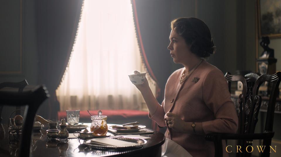 A photo of Olivia Coleman as Queen Elizabeth II on set of The Crown season three.