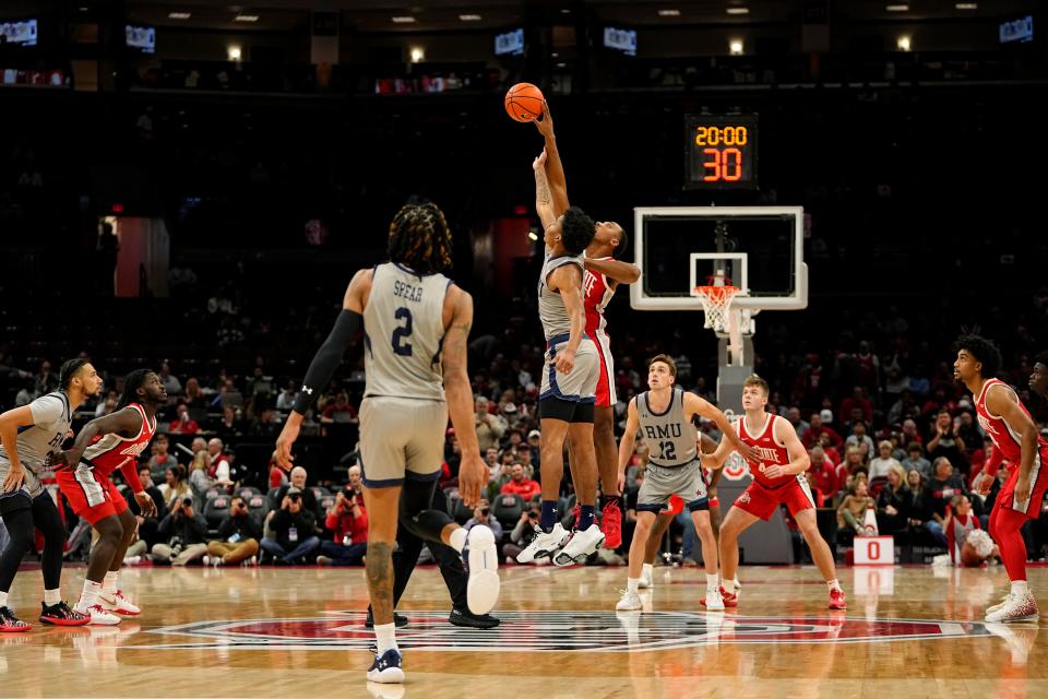 Nov 7, 2022; Columbus, Ohio, USA;  Ohio State Buckeyes guard Zed Key (23) takes the opening tipoff against Robert Morris Colonials forward Stephaun Walker (11) during the first half of the NCAA men's basketball game at Value City Arena. Mandatory Credit: Adam Cairns-The Columbus Dispatch