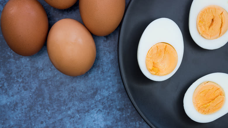 halved hard-boiled eggs