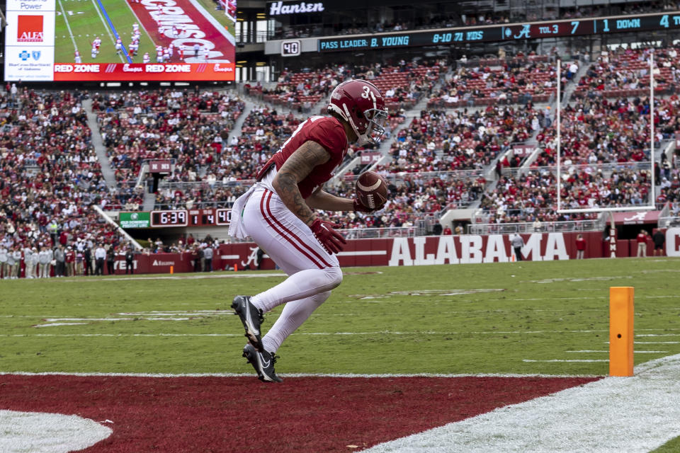 Alabama wide receiver Jermaine Burton (3) scores a touchdown on a reception during the first half of an NCAA college football game against Austin Peay, Saturday, Nov. 19, 2022, in Tuscaloosa, Ala. (AP Photo/Vasha Hunt)
