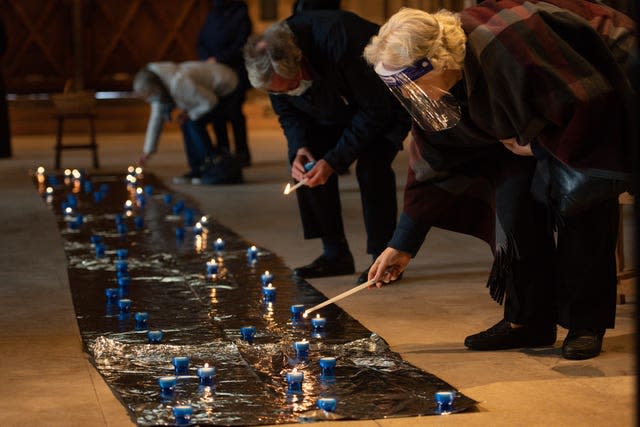 People light candles at Lichfield Cathedral