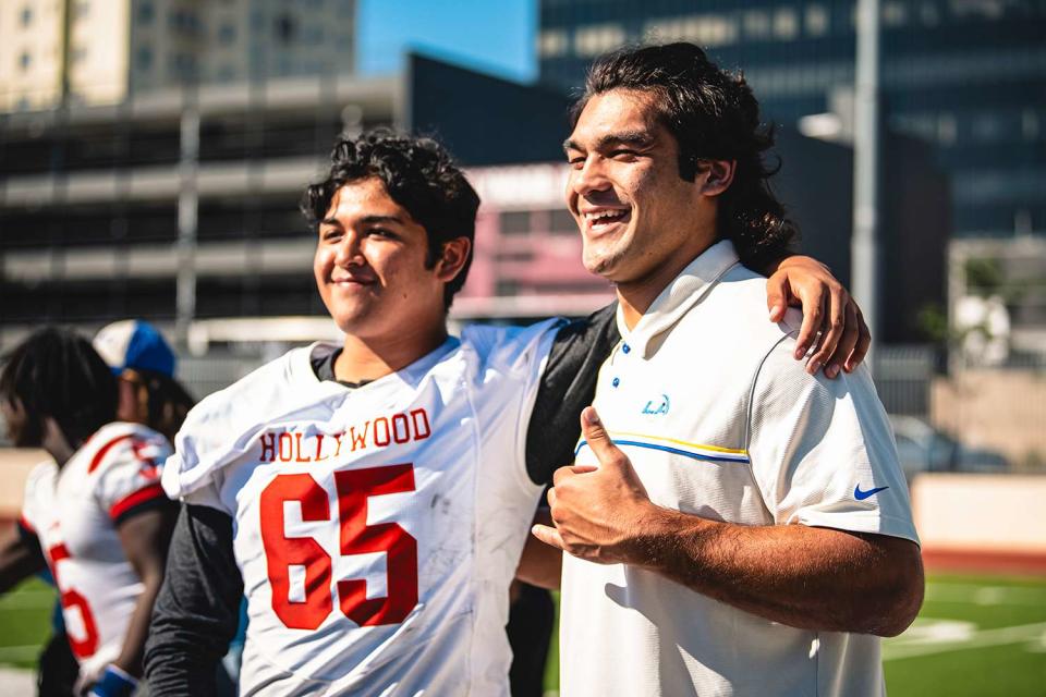 <p>Courtesy LA Rams</p> Rams Rookie Puka Nacua Visits Local High School Football Team Whose Coach is Fighting Cancer 