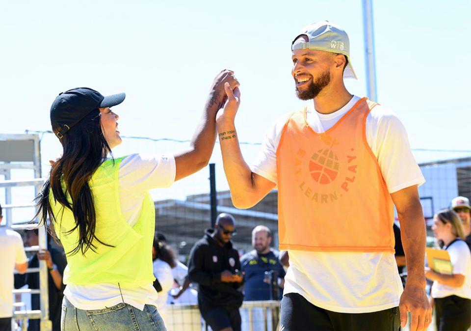 Ayesha Curry and Stephen Curry attend the launch of Stephen & Ayesha Curry's Eat. Learn. Play. New Movement while visiting Lockwood STEAM Academy on September 06, 2023 in Oakland, California.