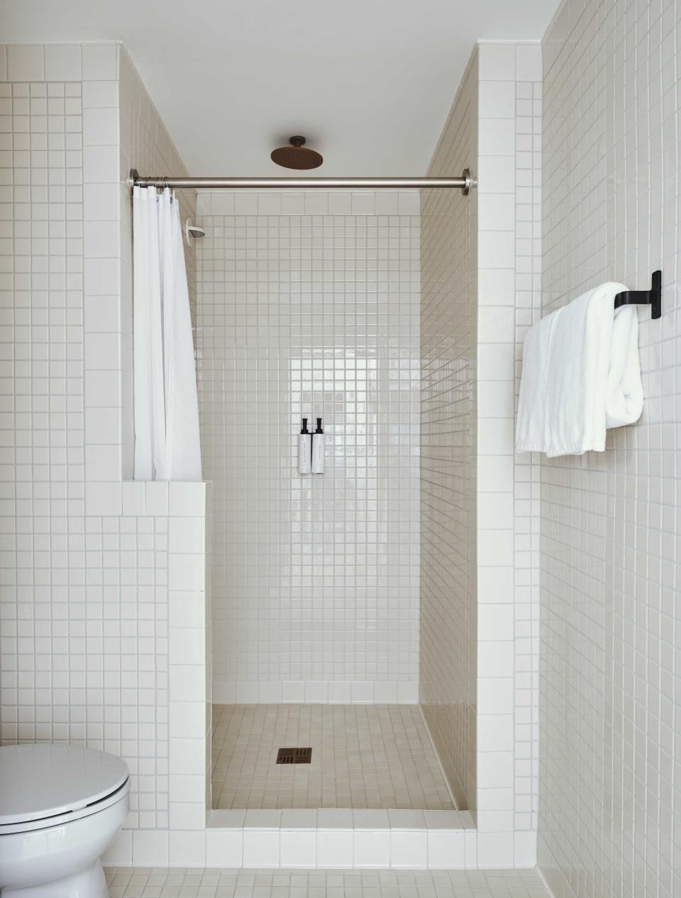 Tile covers the bathroom's surfaces.