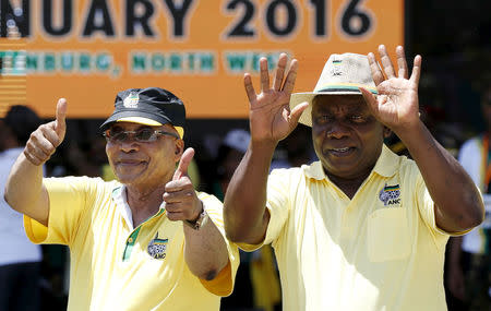 FILE PHOTO: South Africa's President Jacob Zuma (L), gestures next to his Deputy President Cyril Ramaphosa during the party's 104th anniversary celebrations in Rustenburg , South Africa, January 9, 2016. REUTERS/Siphiwe Sibeko/File Photo