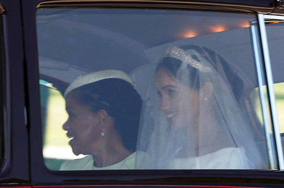 Meghan Markle with her mother Doria Ragland depart for the chapel.