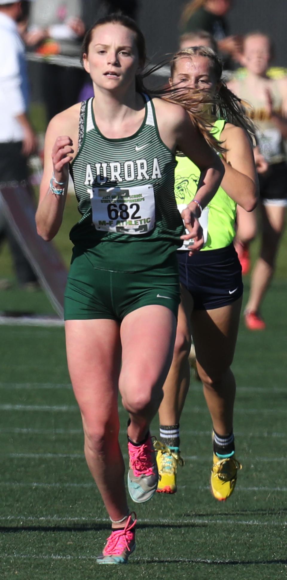 Aurora Morgan Schmitt runs to the finish line in the Division I Girls Cross Country Championship at Fortress Obetz and Memorial Park in Obetz.